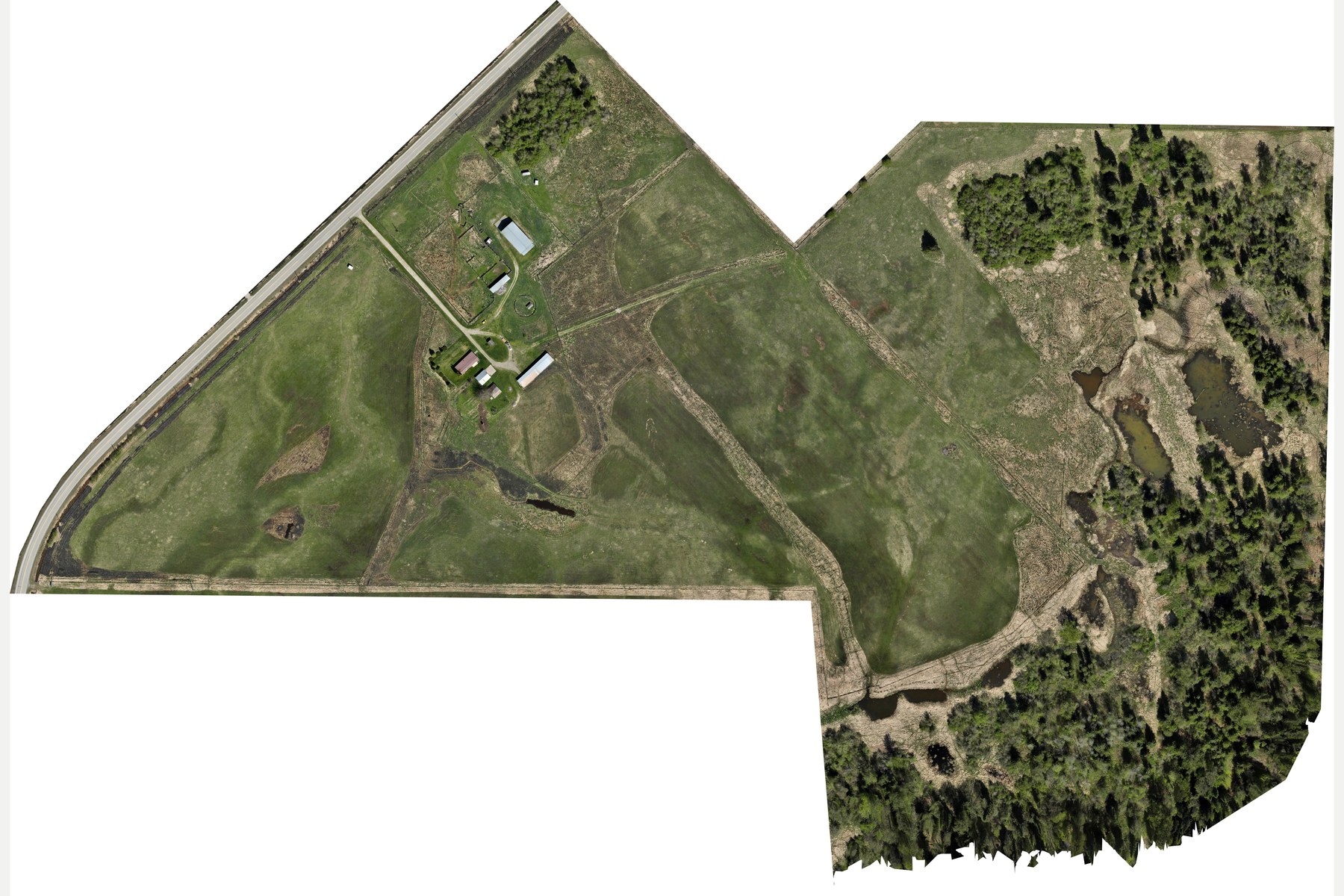 High-resolution orthomosaic overview of a rural Highway 31 property